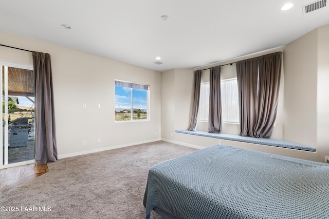 9550 N Manger Rd, Prescott Valley, AZ 86314 - carpeted bedroom featuring multiple windows, access to outside, and recessed lighting