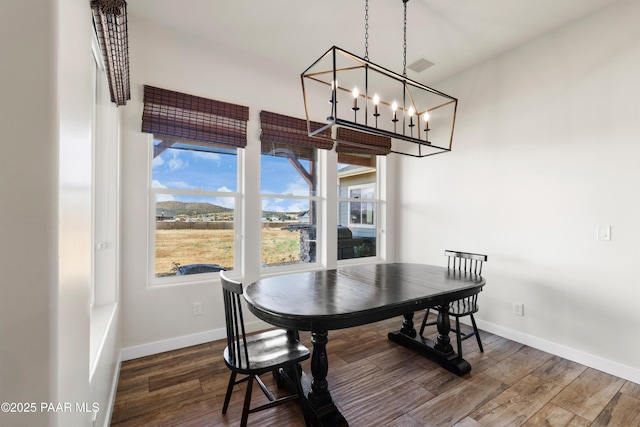 9550 N Manger Rd, Prescott Valley, AZ 86314 - dining area featuring a chandelier and dark wood finished floors