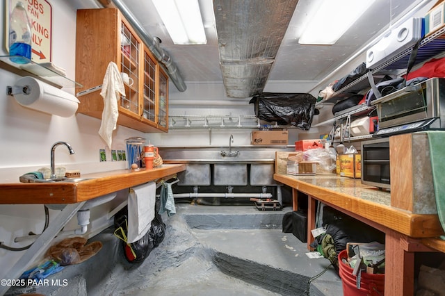 interior space with concrete flooring and a workshop area