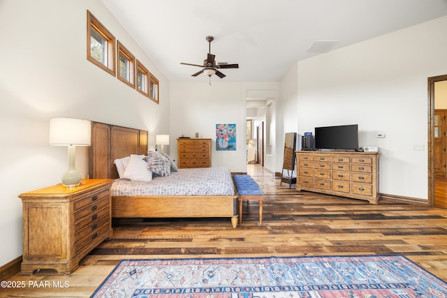 bedroom featuring wood-type flooring and ceiling fan