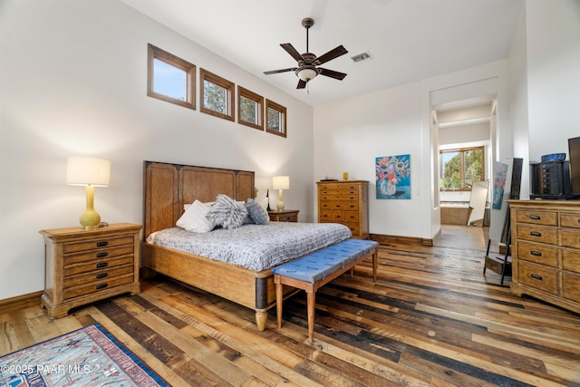 bedroom featuring dark wood-type flooring and ceiling fan