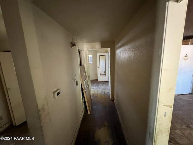 hallway featuring dark wood-type flooring