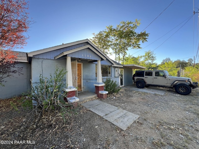 view of front of house with a carport