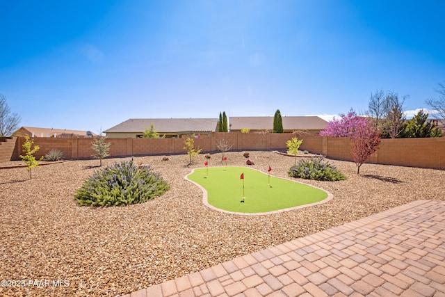 6543 E Falon Ln, Prescott Valley, AZ 86314 - fenced backyard with an area to practice putting