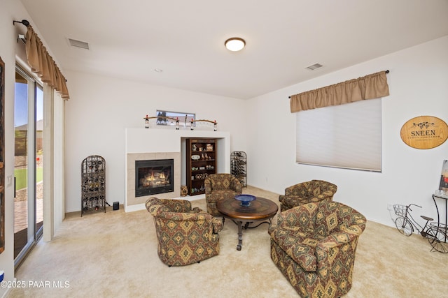 6543 E Falon Ln, Prescott Valley, AZ 86314 - living area with healthy amount of natural light, carpet, and a tile fireplace