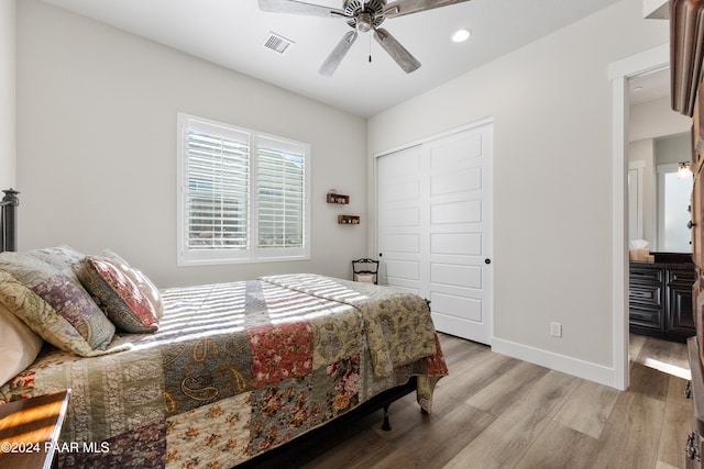 bedroom with recessed lighting, a closet, visible vents, light wood-style flooring, and baseboards