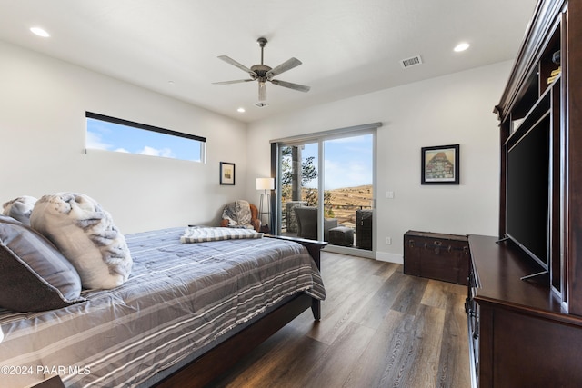 bedroom with recessed lighting, wood finished floors, a ceiling fan, baseboards, and access to exterior