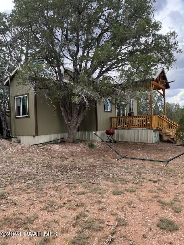 view of yard featuring a deck