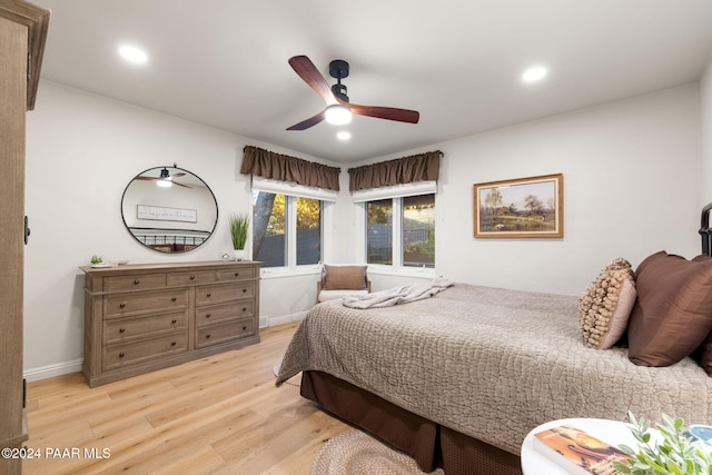 bedroom featuring ceiling fan and light wood-type flooring