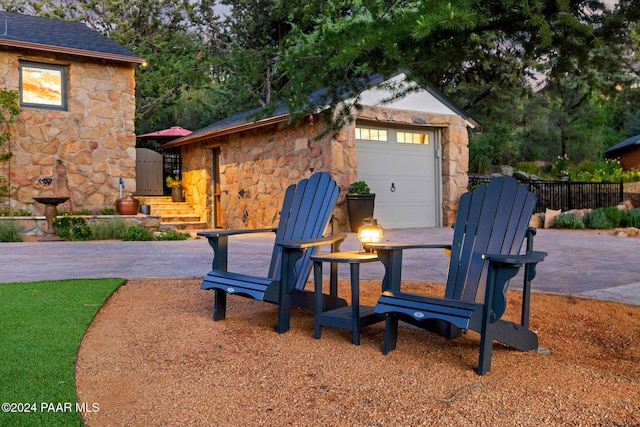 exterior space with an outdoor structure and a garage