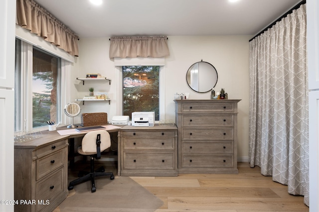 home office with light wood-type flooring