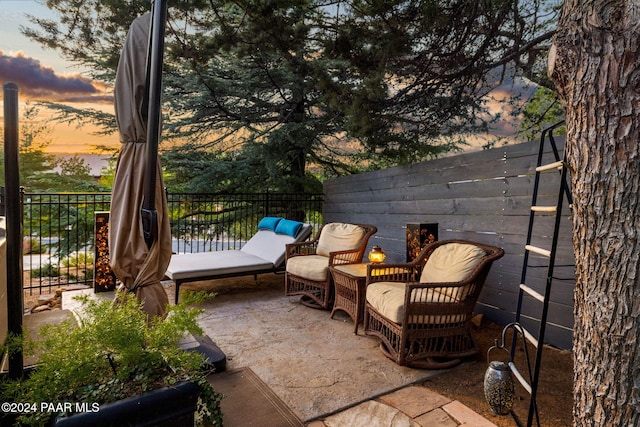 patio terrace at dusk with outdoor lounge area