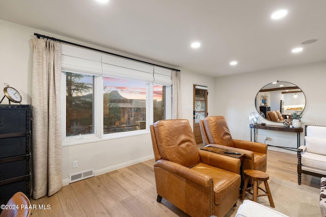 sitting room with light wood-type flooring