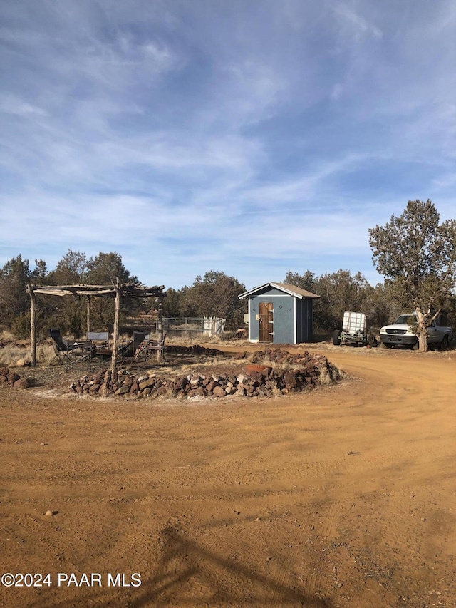 view of yard with a shed