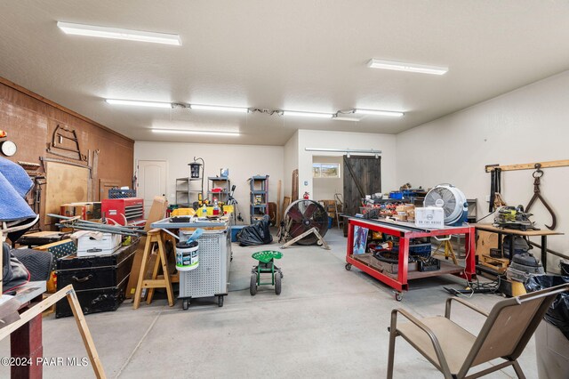9757 N Heartland Dr, Prescott Valley, AZ 86315 - garage featuring a workshop area