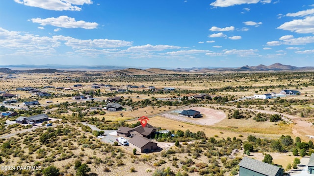 bird's eye view with a mountain view