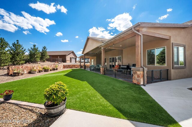 9757 N Heartland Dr, Prescott Valley, AZ 86315 - view of yard with a patio area