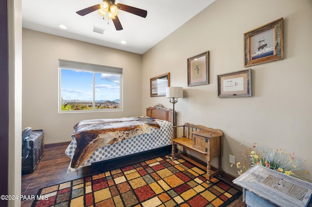 bedroom featuring dark hardwood / wood-style flooring and ceiling fan