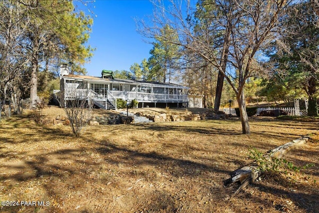 rear view of house with a deck