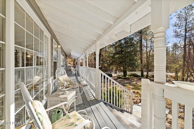 wooden terrace featuring a porch