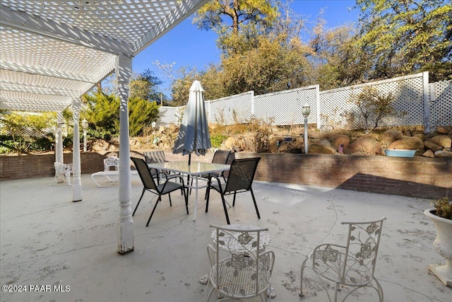 view of patio / terrace featuring a pergola