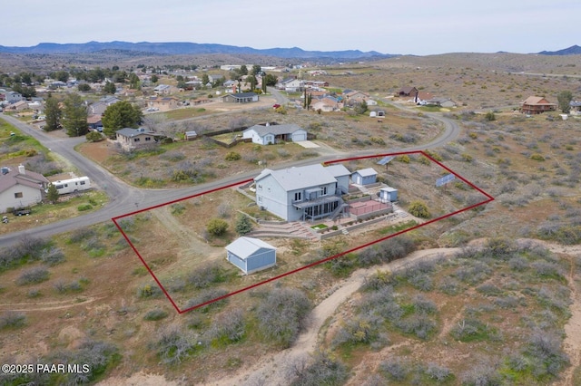 aerial view featuring a mountain view