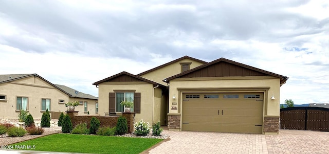 craftsman house with a garage