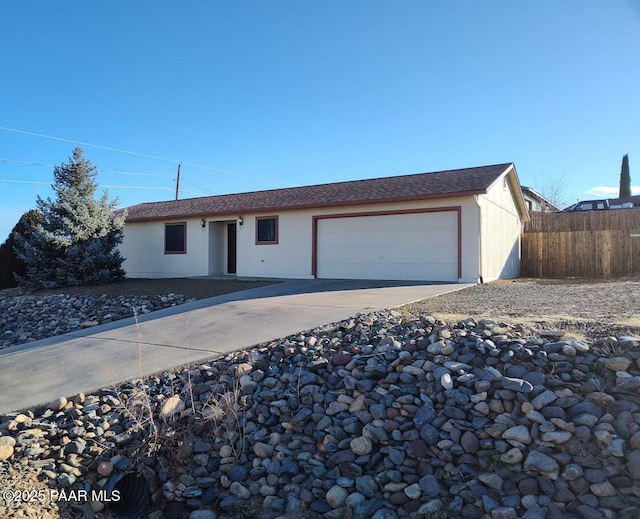 single story home with a garage