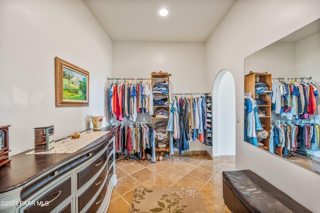 walk in closet featuring light tile patterned floors