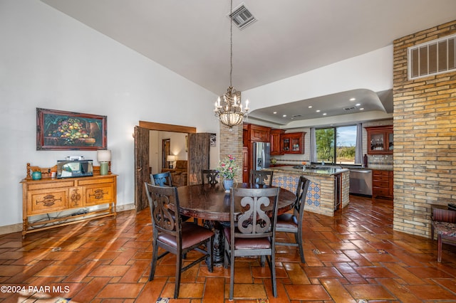 dining room with a notable chandelier