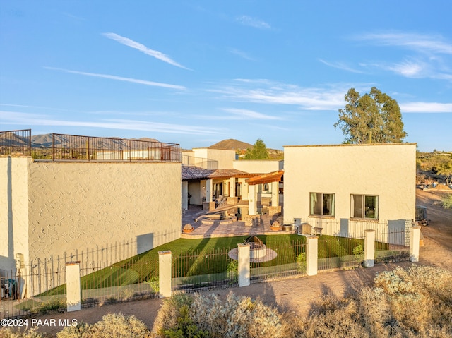 exterior space featuring a yard and a patio area