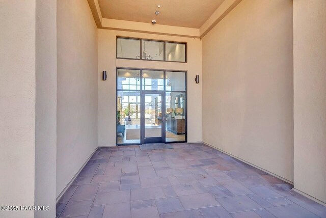 property entrance featuring stucco siding