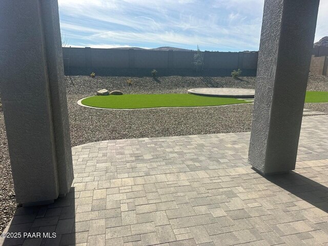 view of patio with a fenced backyard