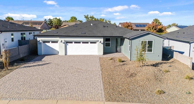 7576 E Louie Ln, Prescott Valley, AZ 86315 - ranch-style house featuring decorative driveway, an attached garage, and roof with shingles