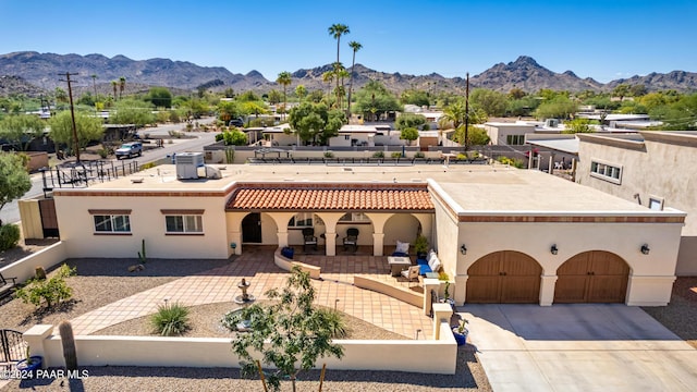 view of front of home with a mountain view