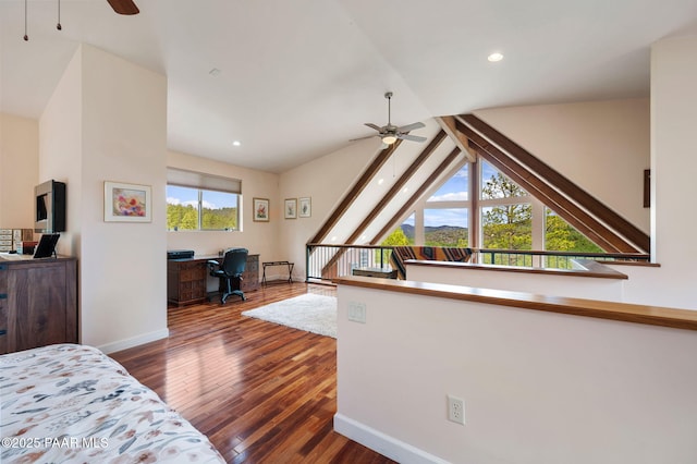 bedroom featuring recessed lighting, baseboards, vaulted ceiling, and hardwood / wood-style floors