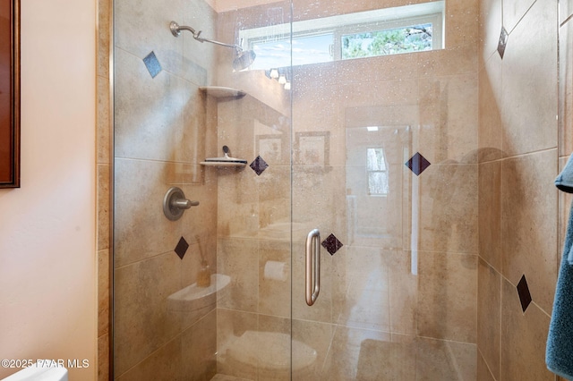 bathroom with a stall shower