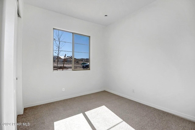 view of carpeted spare room