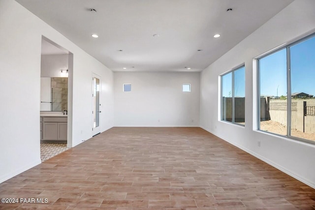 empty room with light wood-type flooring