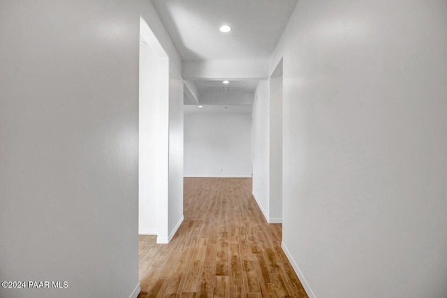 corridor featuring light hardwood / wood-style flooring