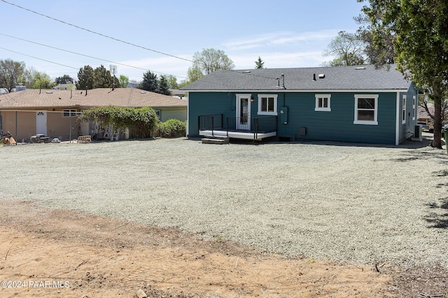 rear view of property with a deck