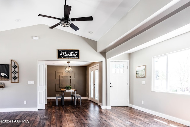 entryway with ceiling fan, lofted ceiling, and dark wood-type flooring