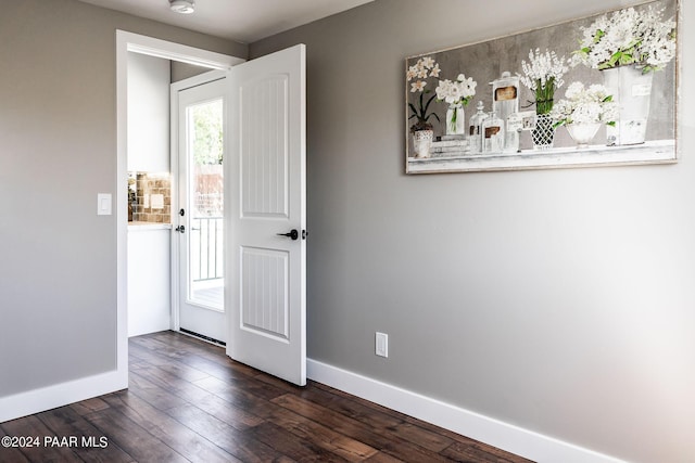 interior space with dark wood-type flooring