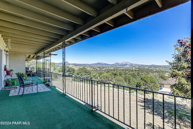 balcony featuring a mountain view