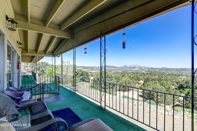 balcony featuring a mountain view