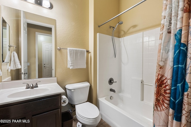 full bathroom with shower / tub combo with curtain, vanity, and toilet