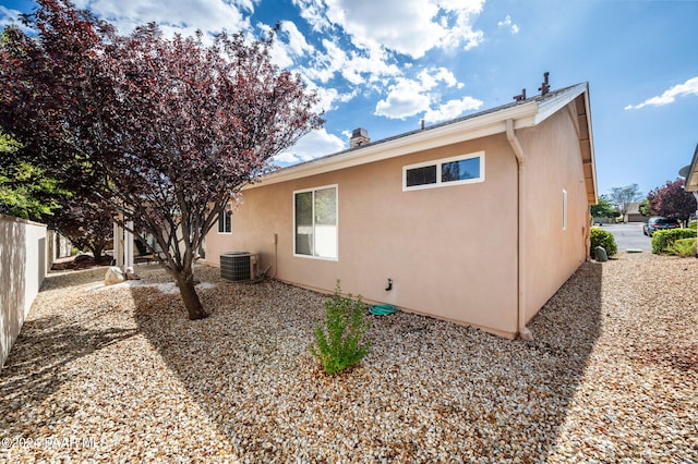 view of property exterior featuring central AC unit