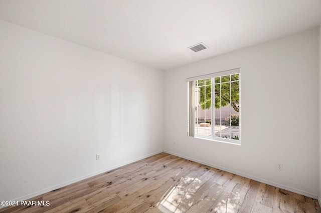 empty room with light wood-type flooring