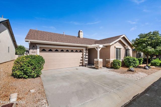 ranch-style home with a garage