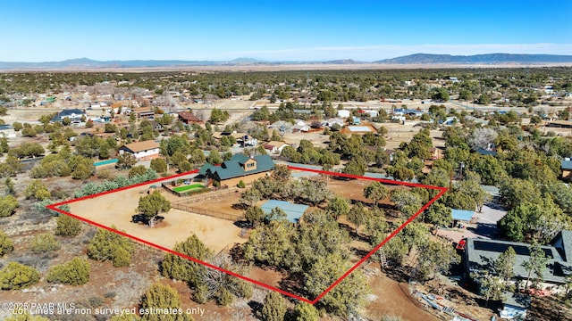 6850 N Harris Dr, Prescott, AZ 86305 - aerial view of property and surrounding area featuring property boundaries highlighted and a mountainous background